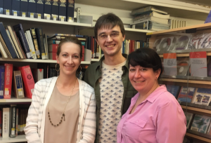 Krista, Konstantin and Kim in the library at MSSES